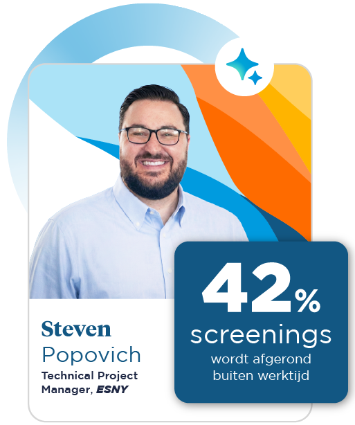 A smiling man with black hair is wearing a blue oxford shirt and glasses, set against a colorful background of blue, orange, and yellow.