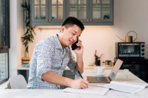 Young Man Working At Home