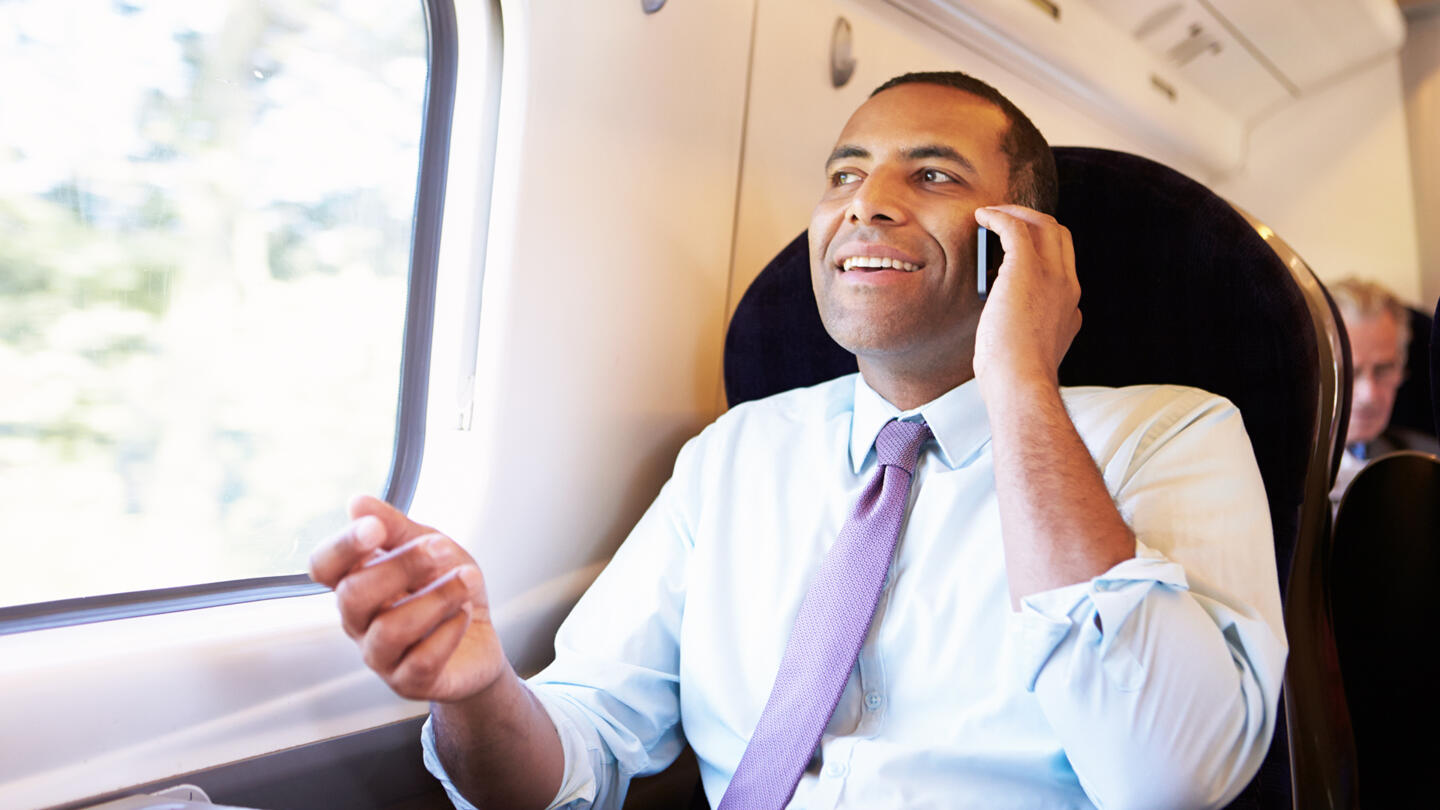 gentleman on a phone call while commuting