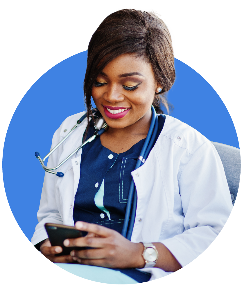 healthcare worker looking at her phone